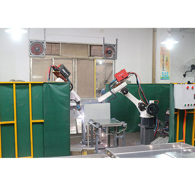 Auto Motoman com o braço robótico industrial